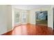 Cozy breakfast nook featuring a bay window and hardwood floors at 1553 Smithson Ct, Lithonia, GA 30058