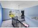 The hallway has a view to the outside and a large chandelier at 1553 Smithson Ct, Lithonia, GA 30058