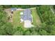 Aerial view of property with a large backyard, in-ground pool, shed, and lush green lawn at 188 A Macedonia Rd, White, GA 30184