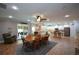 Open layout with dining table adjacent to kitchen and outdoor patio at 188 A Macedonia Rd, White, GA 30184