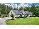 Charming one-story home with a lush lawn, mature landscaping, and an attached two-car garage at 188 A Macedonia Rd, White, GA 30184