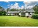 Well-maintained single-story home on a large, lush lot with manicured landscaping and inviting curb appeal at 188 A Macedonia Rd, White, GA 30184
