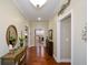 Inviting hallway with hardwood floors and views into other rooms at 188 A Macedonia Rd, White, GA 30184