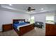 This main bedroom features a ceiling fan, recessed lights, and two windows at 188 A Macedonia Rd, White, GA 30184
