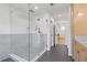Contemporary bathroom with a glass shower featuring a rainfall shower head and bronze fixtures at 3155 Zion St, Scottdale, GA 30079