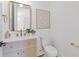 Stylish powder room featuring gold fixtures, marble countertop, and modern decor at 3155 Zion St, Scottdale, GA 30079