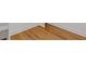 Hardwood floor with white baseboard trim at 3155 Zion St, Scottdale, GA 30079