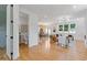 Bright living room with hardwood floors, modern furniture, and an open floor plan layout at 3155 Zion St, Scottdale, GA 30079