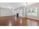 Spacious living room with hardwood floors, fireplace and ample natural light at 4420 Ambassador Way, Cumming, GA 30040