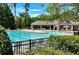 A stunning pool and recreation area, with red mushroom fountains and lots of seating around it at 4420 Ambassador Way, Cumming, GA 30040