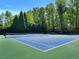 Beautifully maintained outdoor tennis court, perfect for recreational play and exercise at 4420 Ambassador Way, Cumming, GA 30040