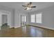 Bedroom with hardwood floors and mirrored closet doors at 1667 Sylvan Sw Rd, Atlanta, GA 30310