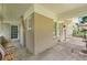 Inviting front porch with swing, brick facade, and white trim at 1667 Sylvan Sw Rd, Atlanta, GA 30310