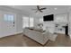 Bright living room with hardwood floors, fireplace, and plenty of natural light at 1667 Sylvan Sw Rd, Atlanta, GA 30310