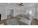 Open-concept living room with hardwood floors and neutral decor at 1667 Sylvan Sw Rd, Atlanta, GA 30310