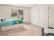 Bedroom with built-in drawers under bed and a large closet at 3003 Hanover Se Ln, Conyers, GA 30094
