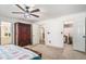 Spacious bedroom boasts ample closet space and neutral carpet at 3003 Hanover Se Ln, Conyers, GA 30094