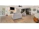 Spacious living room featuring a fireplace, plush seating, and modern flooring for a cozy atmosphere at 3003 Hanover Se Ln, Conyers, GA 30094