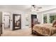 Open bedroom with large closet, adjoining bathroom, and a bay window at 3003 Hanover Se Ln, Conyers, GA 30094