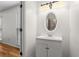 Bathroom featuring a vanity with a mirror and a shower at 365 Norcross St, Roswell, GA 30075