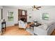 Cozy living room with a brick fireplace, hardwood floors, and neutral furniture at 365 Norcross St, Roswell, GA 30075
