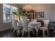 Elegant dining room features a large window and a beautiful display cabinet at 401 Iona Abbey Ct # 6, Smyrna, GA 30082