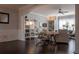 Open-concept living area with hardwood floors, a stylish desk, and comfortable seating at 401 Iona Abbey Ct # 6, Smyrna, GA 30082