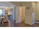 Open concept living room with elegant pillars and hardwood floors at 401 Iona Abbey Ct # 6, Smyrna, GA 30082