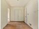 Hallway with hardwood floors, a closet, and doorways to other rooms at 1143 Westview Sw Dr, Atlanta, GA 30310