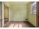 Cozy sunroom with paneled walls and plenty of natural light at 1143 Westview Sw Dr, Atlanta, GA 30310