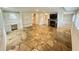 Finished basement featuring stone floors, custom built-ins, a cozy fireplace, and ample space at 2062 Valiant Ne Dr, Atlanta, GA 30345