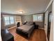 This cozy bedroom features a built-in desk with ample storage and windows with plantation shutters at 2062 Valiant Ne Dr, Atlanta, GA 30345
