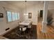 Formal dining room featuring elegant lighting, large windows, and classic decor at 2062 Valiant Ne Dr, Atlanta, GA 30345