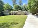 Charming home with lush front lawn, long driveway, and inviting curb appeal at 2062 Valiant Ne Dr, Atlanta, GA 30345