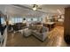 Spacious living area with hardwood floors, fireplace, and a modern, open layout at 2062 Valiant Ne Dr, Atlanta, GA 30345