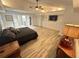 Comfortable main bedroom features ample storage, neutral color scheme, and modern ceiling fan at 2062 Valiant Ne Dr, Atlanta, GA 30345