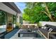 Stylish patio featuring an outdoor dining set and comfortable seating for entertaining at 23 Walthall Ne St, Atlanta, GA 30317