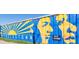 ReynoldsTown community art in blue and yellow at 23 Walthall Ne St, Atlanta, GA 30317