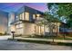 Contemporary two-story home with modern architectural details and a manicured front yard at 23 Walthall Ne St, Atlanta, GA 30317