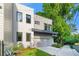 Modern two-story house featuring a clean design, garage, and landscaping at 23 Walthall Ne St, Atlanta, GA 30317