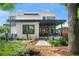 Striking modern home exterior featuring a covered porch, clean lines, and manicured landscaping for curb appeal at 23 Walthall Ne St, Atlanta, GA 30317