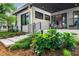 Stylish exterior view with landscaping and a covered patio, showcasing modern design and outdoor living space at 23 Walthall Ne St, Atlanta, GA 30317