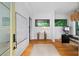 Bright foyer with hardwood floors, minimalist decor, and natural light streaming through modern windows at 23 Walthall Ne St, Atlanta, GA 30317