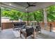 Inviting covered patio offers ample seating with a backyard view, perfect for relaxation at 23 Walthall Ne St, Atlanta, GA 30317