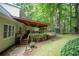 Large deck overlooking wooded lot with playhouse at 3788 Westwick Nw Ct, Kennesaw, GA 30152
