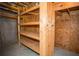 Basement storage area with wood shelving units at 3788 Westwick Nw Ct, Kennesaw, GA 30152