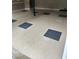 Epoxy basement floor with decorative square rug pattern at 3788 Westwick Nw Ct, Kennesaw, GA 30152
