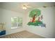 This bedroom has a playful Winnie the Pooh mural at 3788 Westwick Nw Ct, Kennesaw, GA 30152
