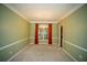 Charming dining area features chandelier, ample natural light, and carpet at 3788 Westwick Nw Ct, Kennesaw, GA 30152