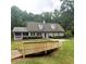 Ranch style home with a charming bridge at 3788 Westwick Nw Ct, Kennesaw, GA 30152